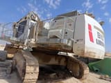 2014 Liebherr R9100 crawler excavator rear three-quarter view