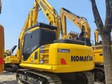 Komatsu PC130 crawler excavator, rear three-quarter view