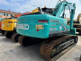 Kobelco SK210LC crawler excavator, rear three-quarter view