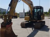 2021 Caterpillar 313-07GC crawler excavator, front three-quarter view