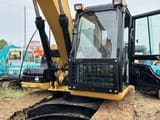Caterpillar 315D2GC crawler excavator cab and boom view