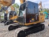 2023 Caterpillar 313D2 GC crawler excavator, front three-quarter view