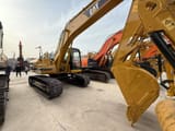 2013 Caterpillar 320B crawler excavator, side view