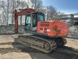 2009 Hitachi Zaxis 180LCN crawler excavator, rear three-quarter view