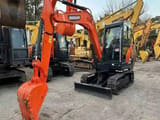 2022 Doosan DX60-9C mini excavator, front three-quarter view