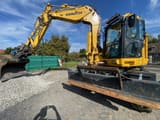 2020 Komatsu PW118MR-11 wheel excavator, front three-quarter view