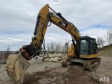 2018 Caterpillar 325FL crawler excavator, side view