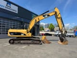 2011 Caterpillar 324D crawler excavator, side view