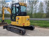 2022 Caterpillar 303.5 crawler excavator, rear three-quarter view