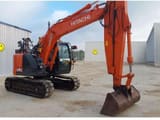 2018 Hitachi ZX135US-6 crawler excavator side view