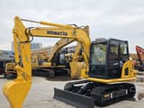 2022 Komatsu PC70-8 mini excavator, front three-quarter view
