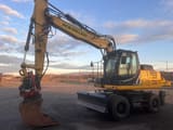 2013 New Holland WE170B wheel excavator side view