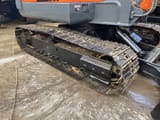 2022 Doosan DX225 crawler excavator undercarriage view