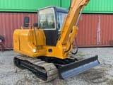 2010 Caterpillar 306 crawler excavator, front three-quarter view