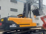 2024 Hyundai HX340HD excavator, rear three-quarter view