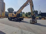 2024 Caterpillar MH3024 wheel excavator side view