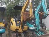 2023 Caterpillar 302C mini excavator, front three-quarter view