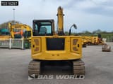 2019 Caterpillar 308 mini excavator, rear three-quarter view