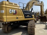 2021 Caterpillar 349 crawler excavator, rear three-quarter view