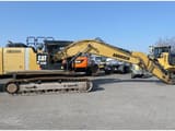 2012 Caterpillar 320E crawler excavator, side view