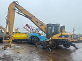 2005 Caterpillar M322C material handler, side view