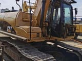 Escavatore cingolato Caterpillar 320D del 2018, vista laterale