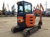 2025 Hitachi 30 ZX30 crawler excavator, rear three-quarter view