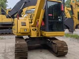 2024 Komatsu PC70-7 excavator, rear three-quarter view
