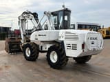2013 Mecalac 12MTX wheel excavator, rear three-quarter view