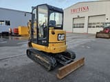 2015 Caterpillar 302.7DCR mini excavator, front three-quarter view