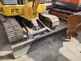 2023 Komatsu PC50 mini excavator front view with blade