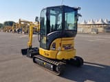 2023 Komatsu PC24MR-5 mini excavator, rear three-quarter view