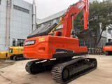 2022 Doosan DX225LC-9C crawler excavator, rear three-quarter view