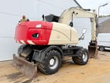 2011 Caterpillar M316D wheel excavator, rear three-quarter view