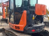 2025 Hitachi Zaxis 55 mini excavator rear three-quarter view