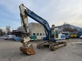2011 Komatsu PC210LC-8 crawler excavator, side view