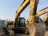 2024 Caterpillar 320GX crawler excavator, front three-quarter view