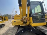2022 Komatsu PC120-8 crawler excavator, rear view of boom and cab
