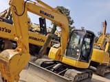 2024 Komatsu PC78US mini excavator, front three-quarter view