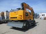 2023 Liebherr A916 wheel excavator, rear three-quarter view