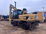 2012 Caterpillar M322D MH material handler, rear three-quarter view