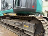 2015 Kobelco SK135SR crawler excavator side view of tracks and undercarriage