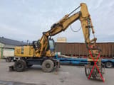2006 Komatsu PW180-7K wheel excavator side view