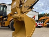 2022 Caterpillar 320GC crawler excavator bucket and thumb attachment