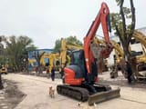 2024 Kubota KX163-5 mini excavator, rear three-quarter view