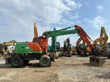 2006 New Holland MH-PLUS wheel excavator, side view