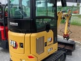 2023 Caterpillar 301.6 mini excavator, rear three-quarter view
