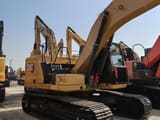 2024 Caterpillar 320GC crawler excavator, rear three-quarter view