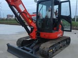 2022 Kubota U55-4 mini excavator, front three-quarter view