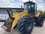 2007 New Holland W170 wheel loader, front three-quarter view